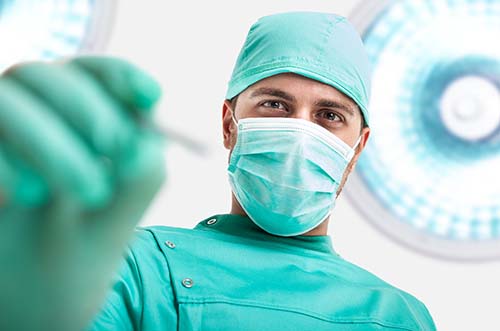 emergency dental services dentist performing emergency dental services on a patient